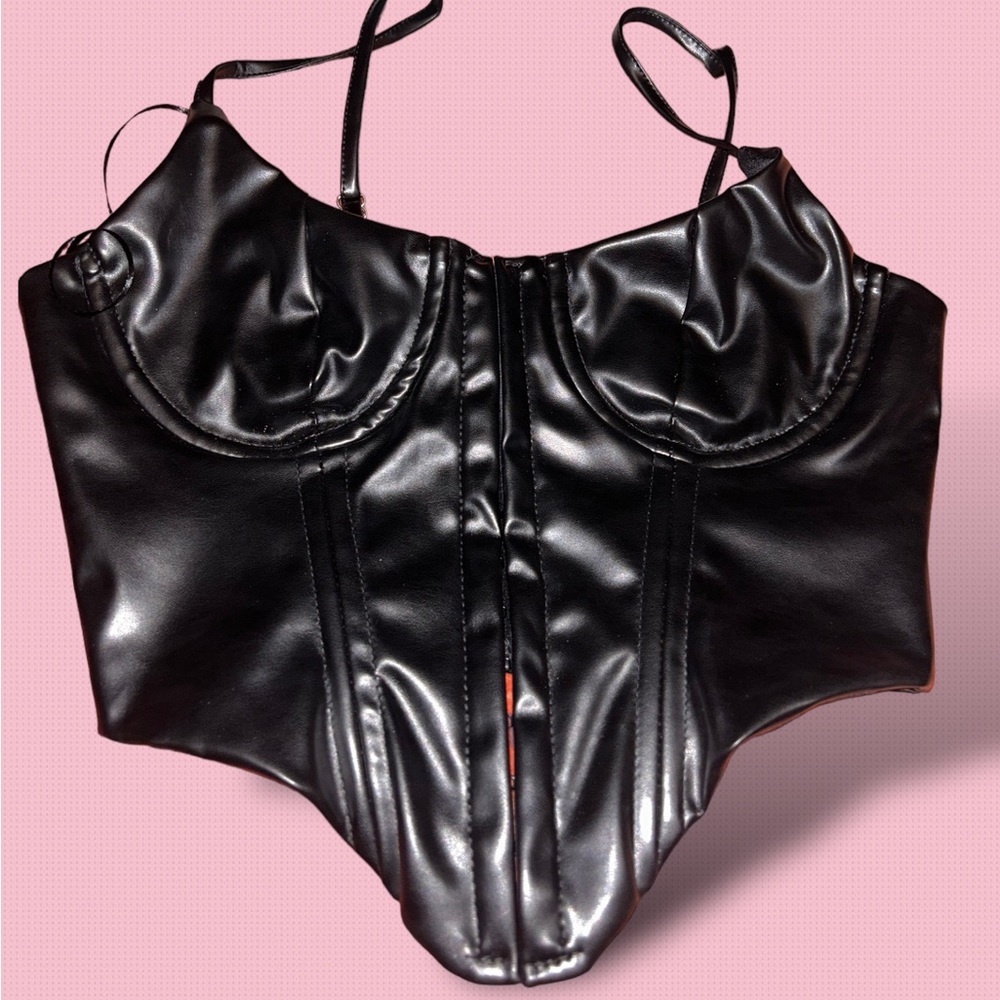 Black corset going out top